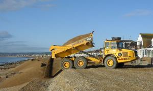 Dumtruck tipping beach material