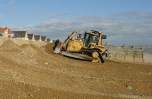 Bulldozer reprofiling cliff east of Sovereign Harbour