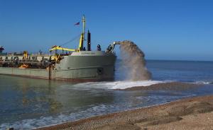 Dredger Sospan Dau discharging beach material