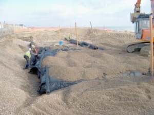 Covering the tyre bales near the surface