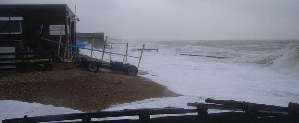 Waves attacking the two boat houses at Grey Towers, Pevensey Bay
